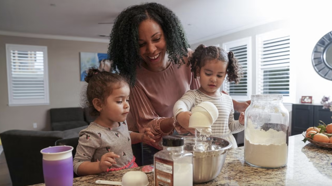 Theanne Griffith, Assistant Professor in the UC Davis Department of Physiology and Membrane Biology is photographed in her home in Woodland with her daughters Violeta Contreras and Lila Contreras.