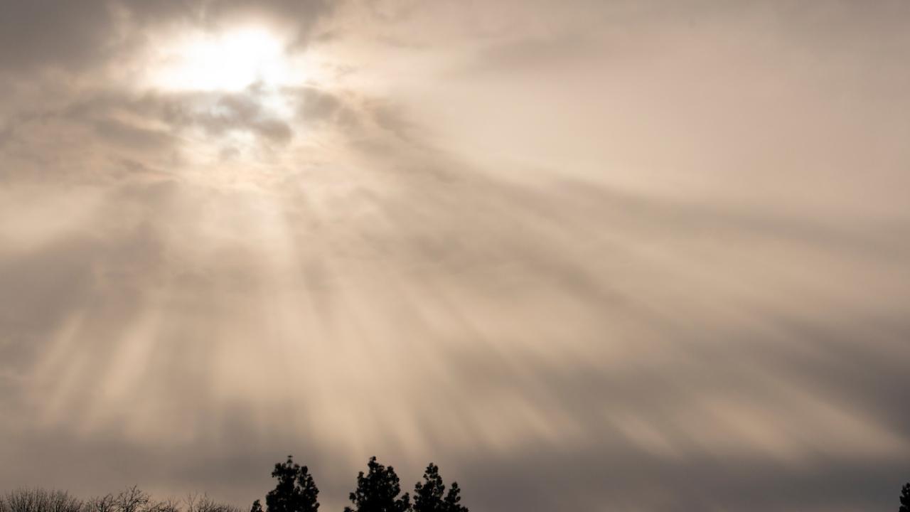 The sun start to break through clouds on January 25, 2021.