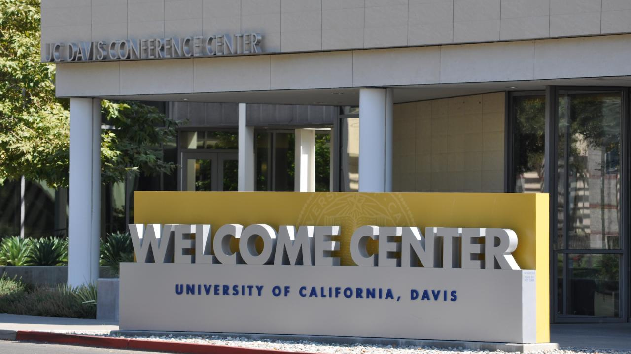 UC Davis Welcome Center building entrance sign.