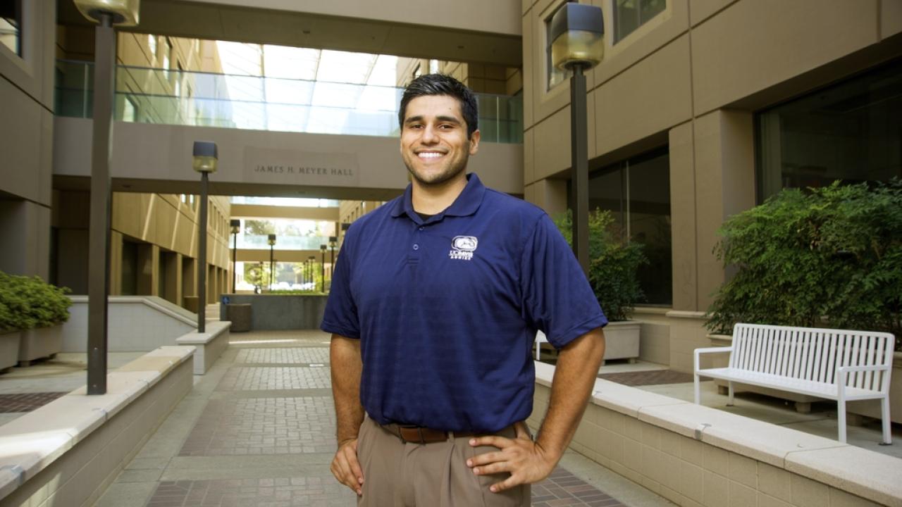 Albert Aguilera in front of Meyer Hall