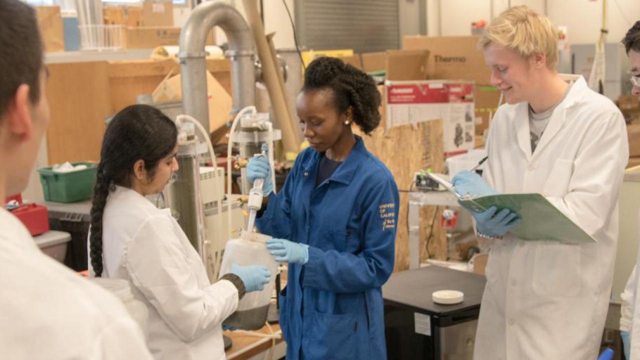 Professor Maureen Kinyua with students