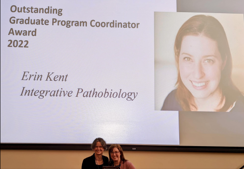 2022 Outstanding Graduate Program Coordinator Erin Kent stands with Nicole Rabaud, executive director of student and postdoctoral support in Graduate Studies.