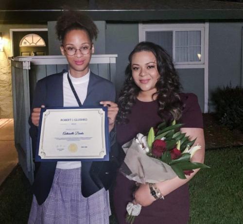 Banks and daughter Nevaeh after Banks received the Robert J. Glushko Prize for Distinguished Undergraduate Research.