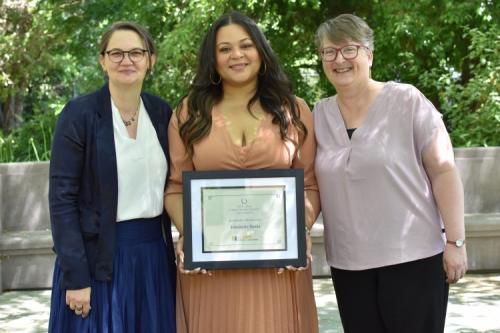 Dr. Cynthia Carter Ching and Dr. Lauren Lindstrom celebrate Banks winning the 2023 Graduate Group in Education Academic Distinction award.