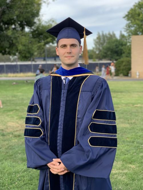 Jonathan Minnick, Ph.D. in Commencement Regalia