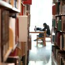 student studies in the library