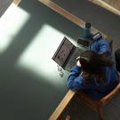 A student studies for finals in Shields Library.