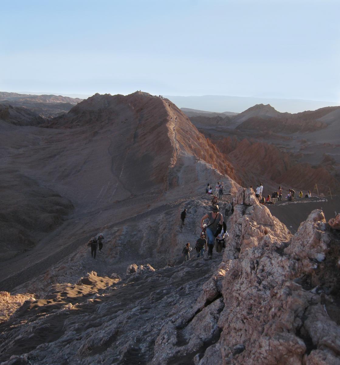 Markovich hiking along a ridge in Chile